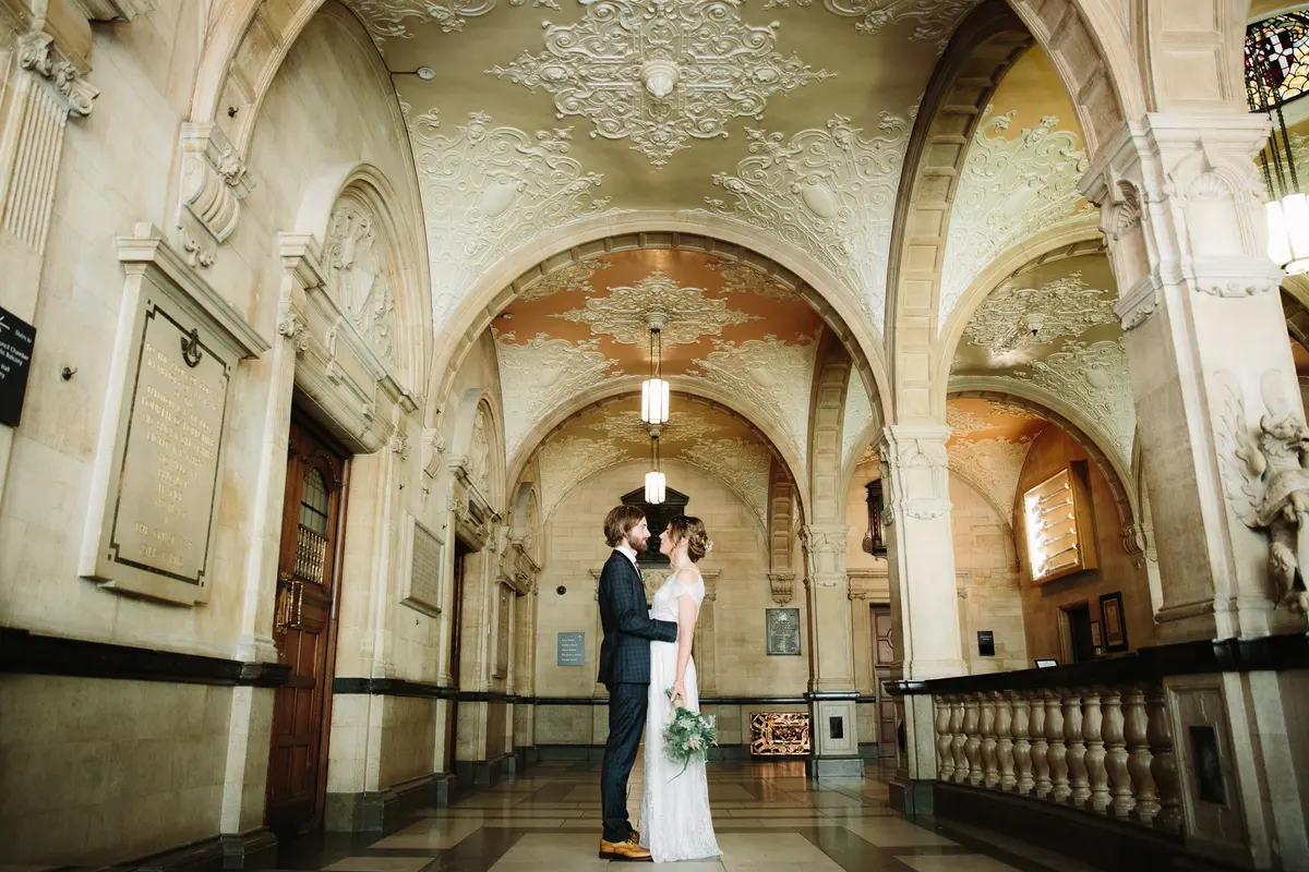 Married Couple posing at the Oxford Wedding Fairs - by Philippa James Photography