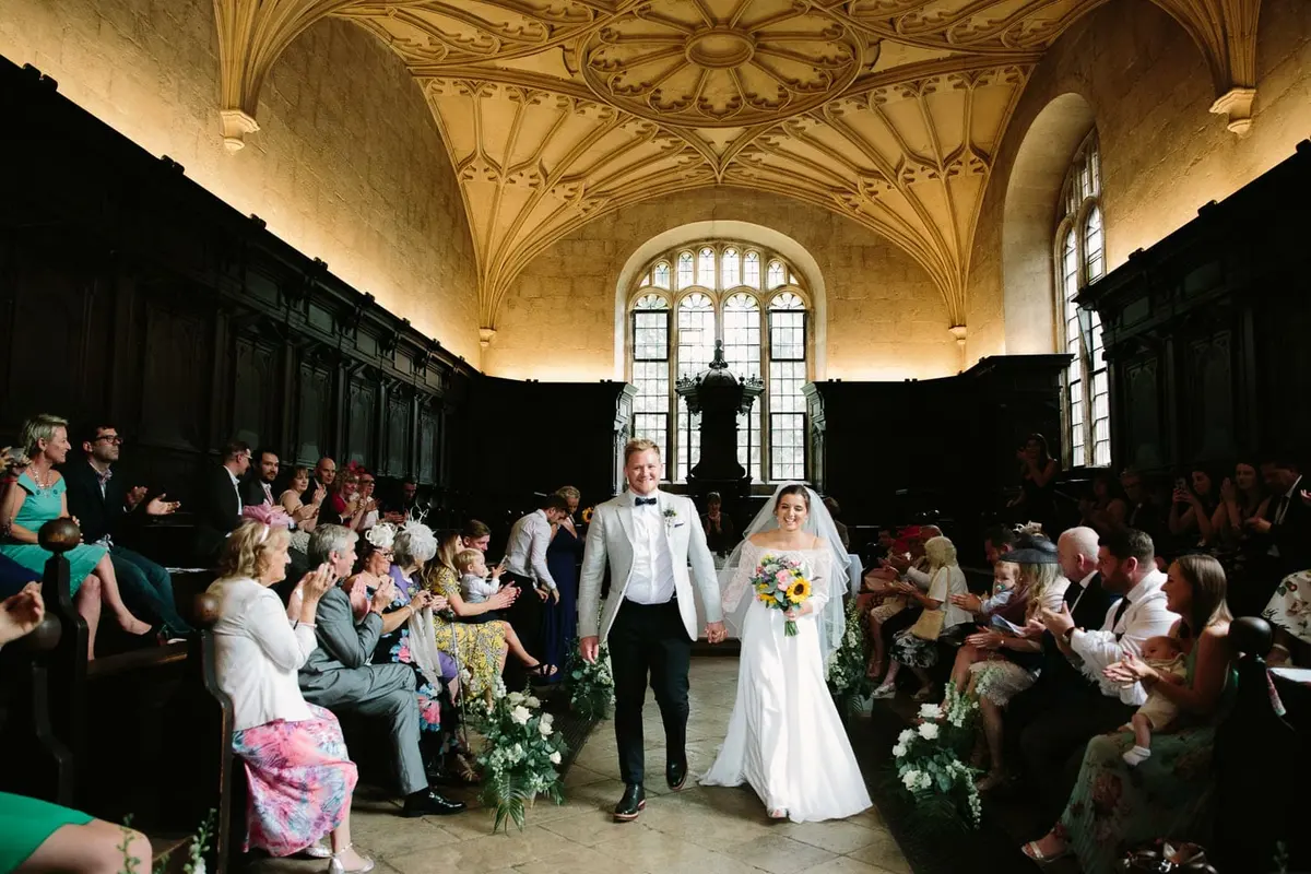 Bride and Groom leaving The Bodleian