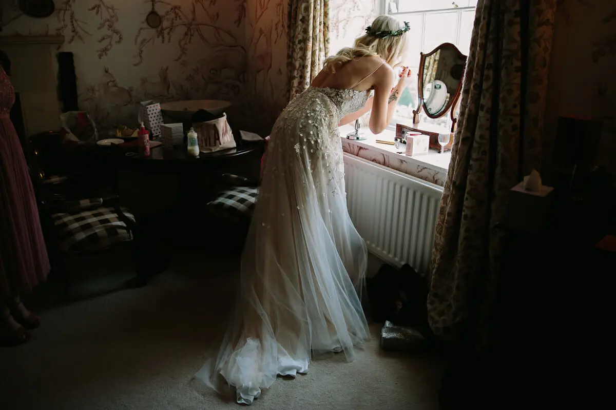 bride getting ready at dewsall court 