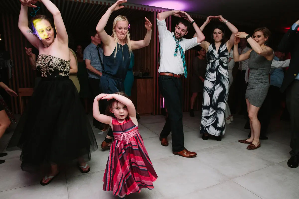 Guests dancing at Oxfordshire wedding with DJ lighting and music