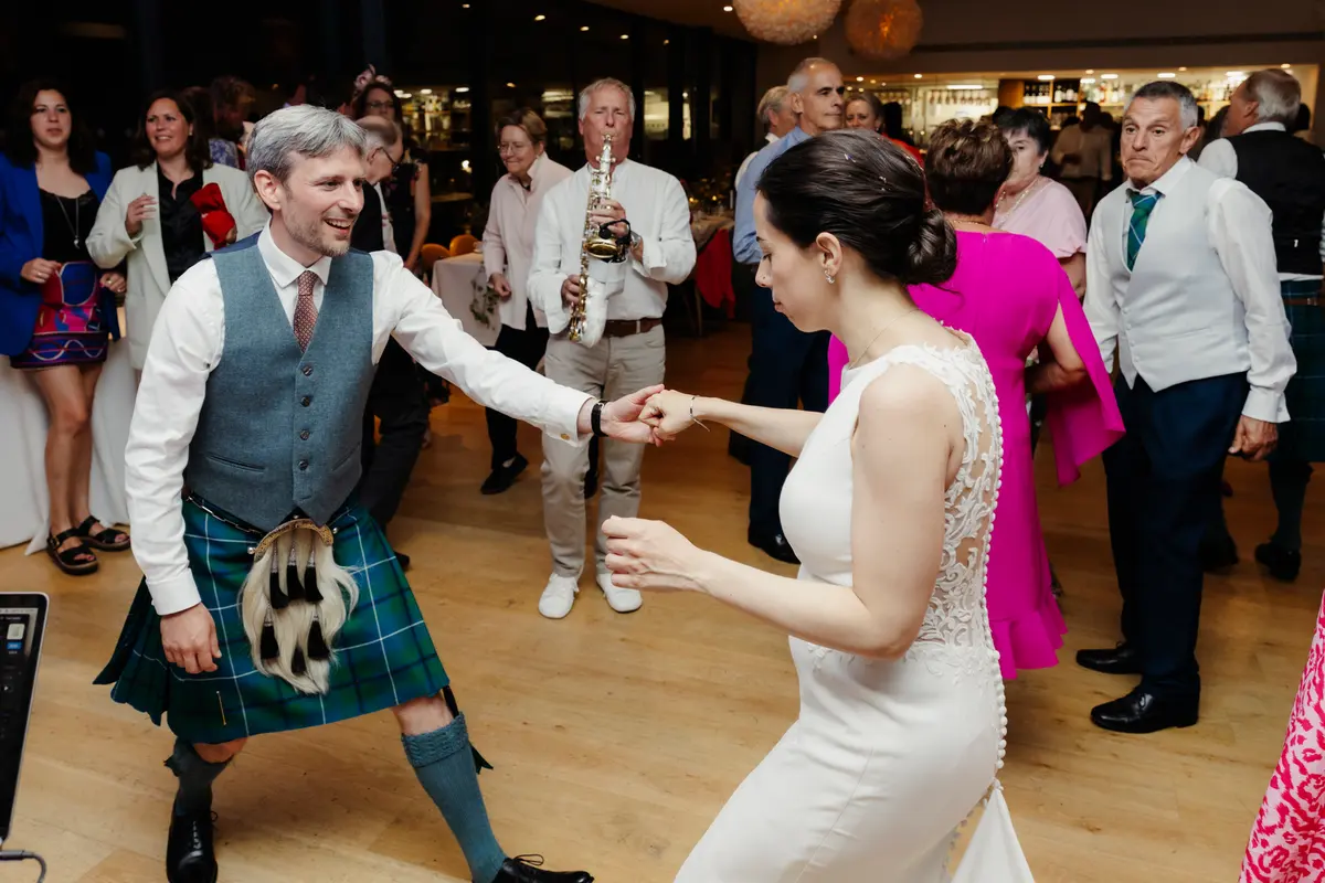 Wedding couple dancing to sax at Ashmolean Museum Oxford