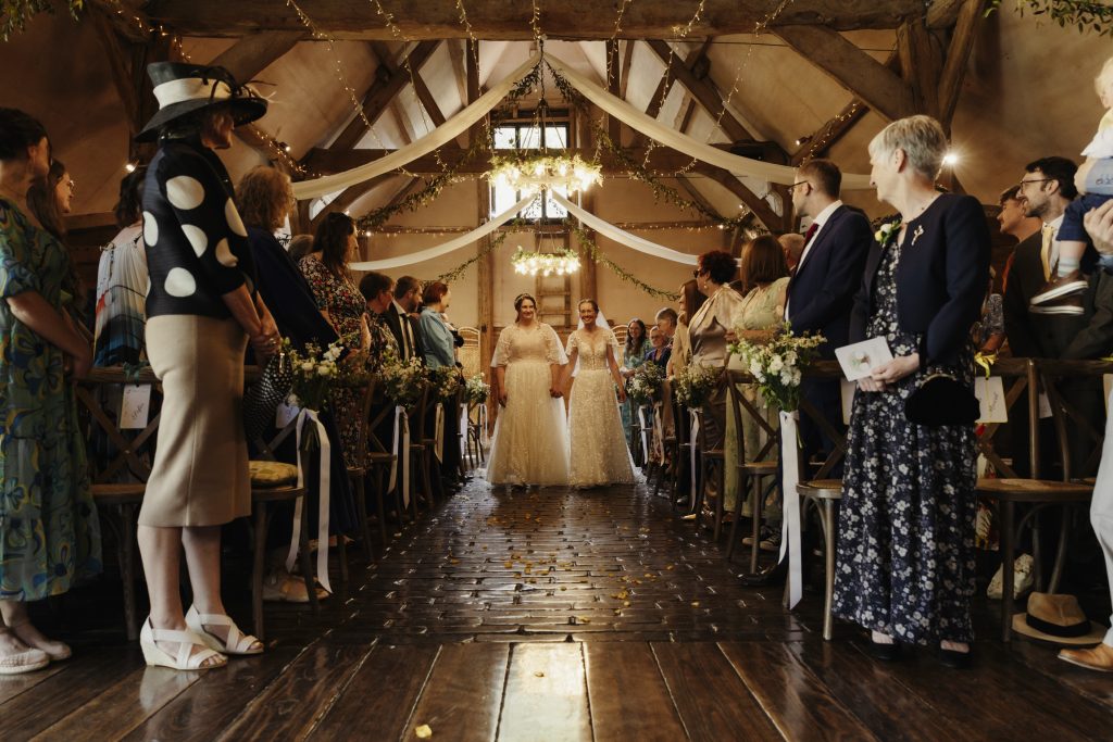 Two brides getting married at Lains Barn Wedding in Oxfordshire