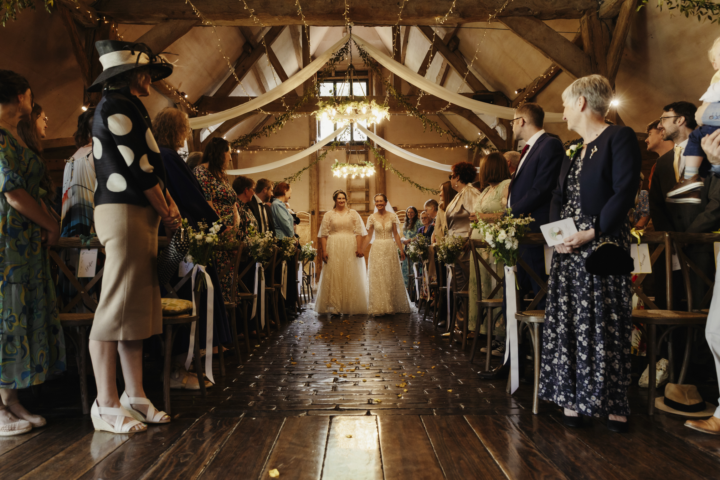 Two brides getting married at Lains Barn Wedding in Oxfordshire