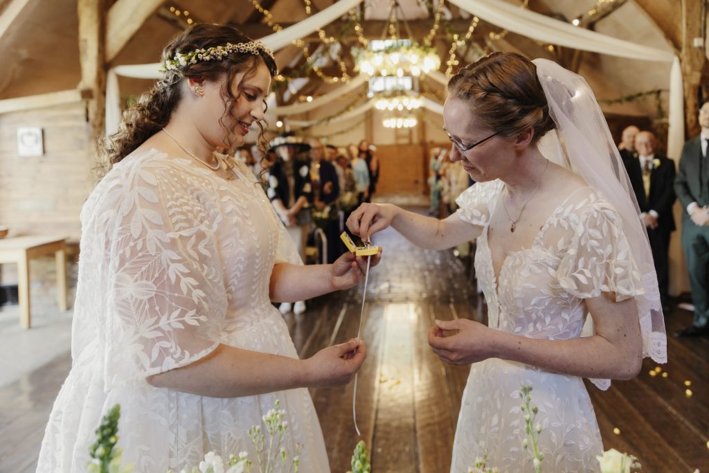 ring exchange at Lains Barn Wedding Venue