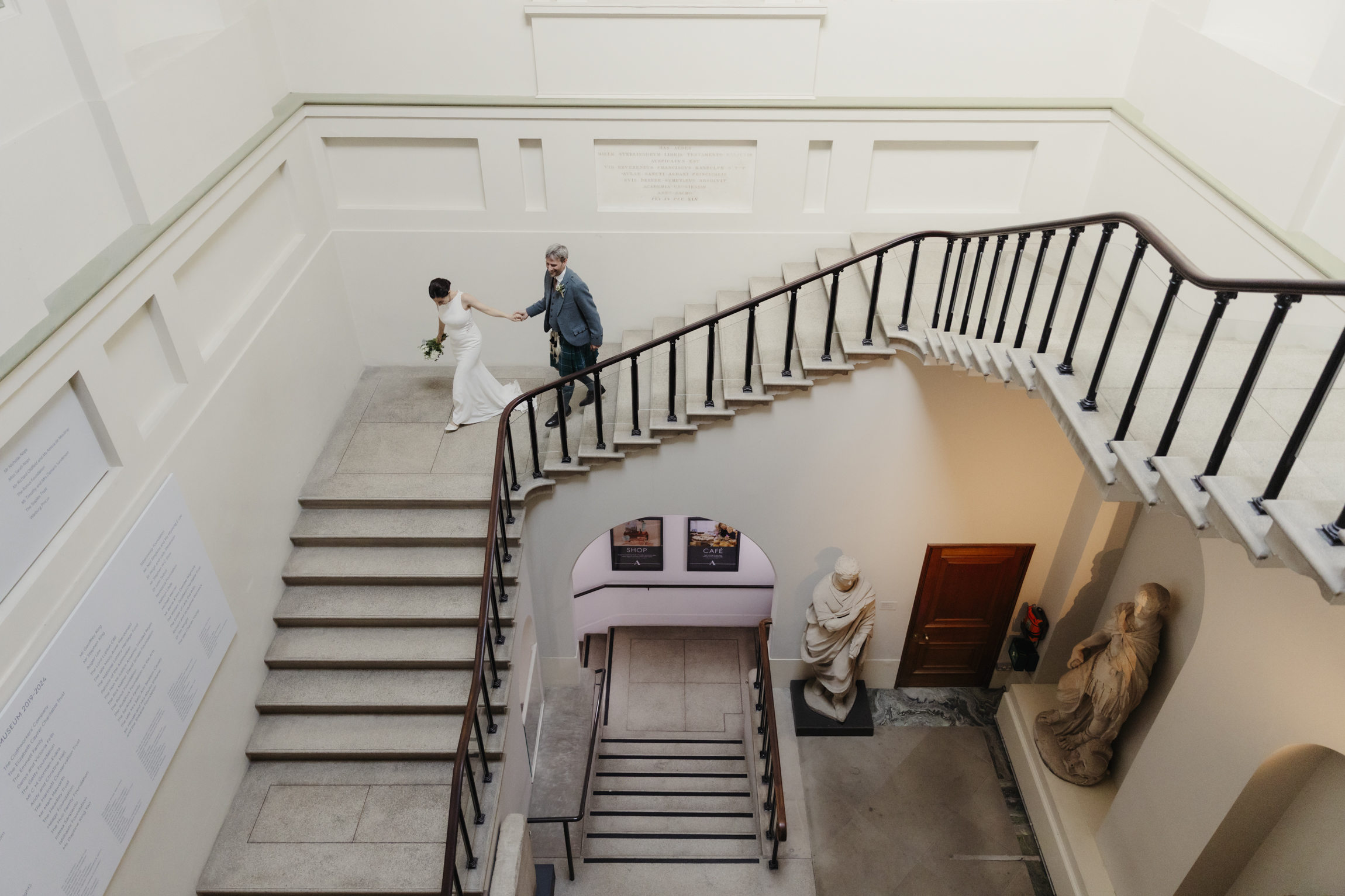 Sweeping staircase ceremony backdrop at Ashmolean Museum Oxford