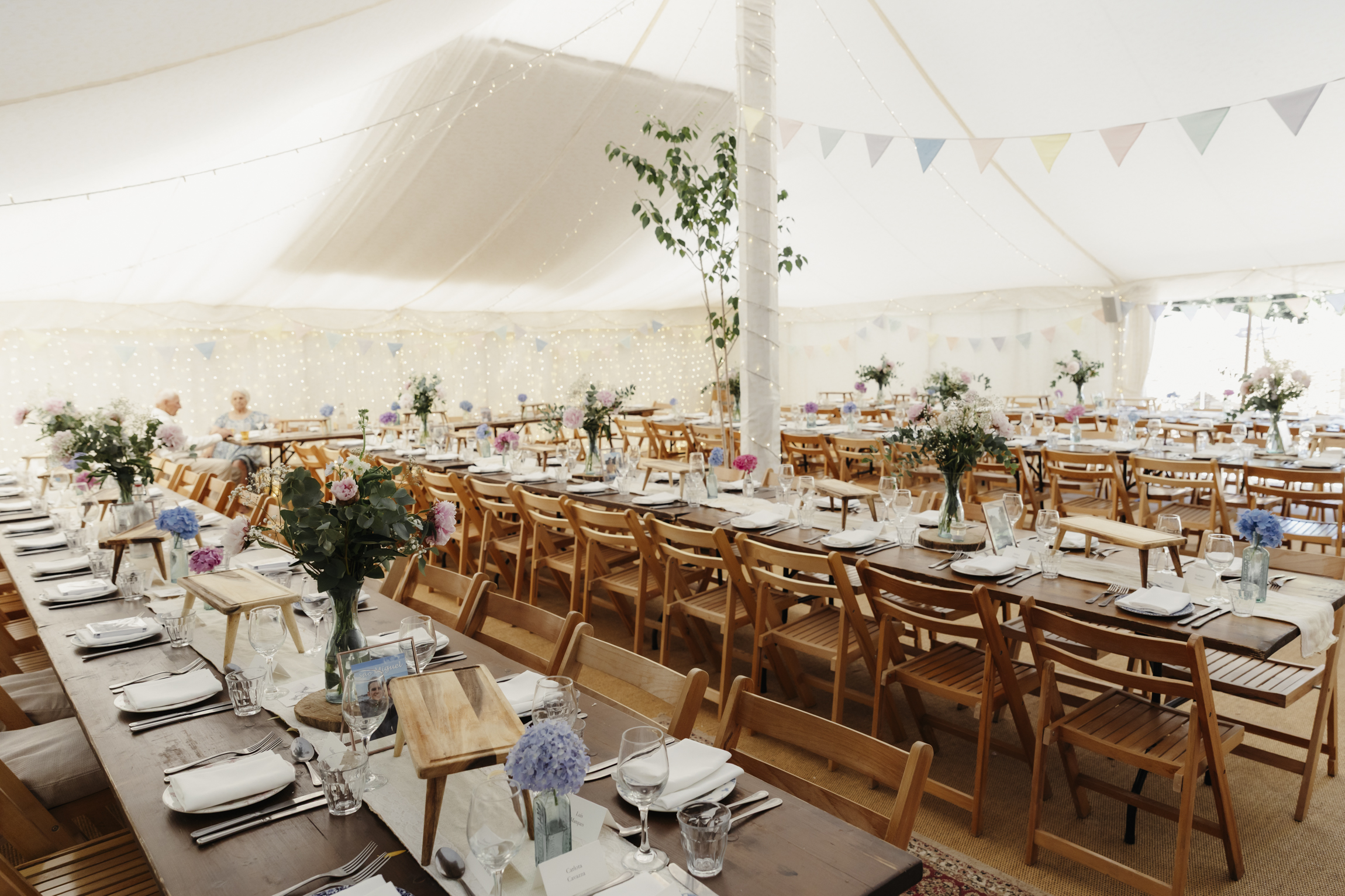Wedding marquee at The Perch Oxford with tables and décor

