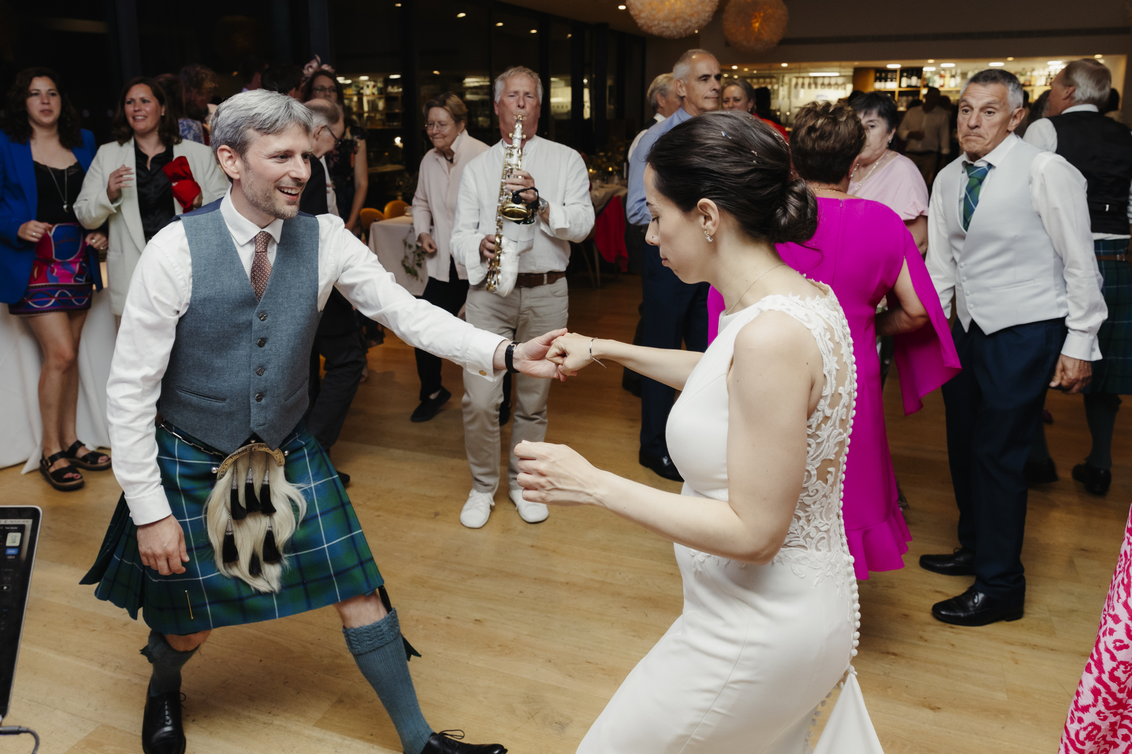 Wedding couple dancing to sax at Ashmolean Museum Oxford
